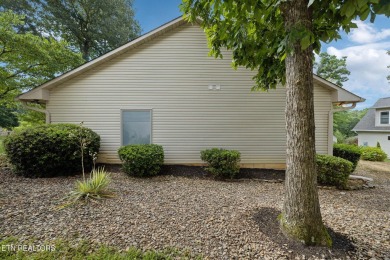 Set on a prime corner lot in the heart of Tellico Village, this on Toqua Golf Course - Loudon County in Tennessee - for sale on GolfHomes.com, golf home, golf lot