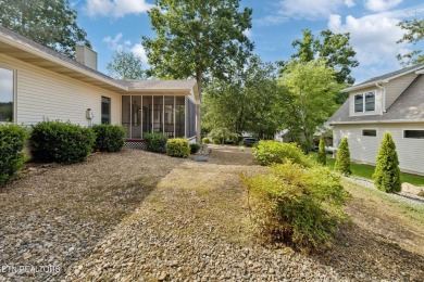 Set on a prime corner lot in the heart of Tellico Village, this on Toqua Golf Course - Loudon County in Tennessee - for sale on GolfHomes.com, golf home, golf lot