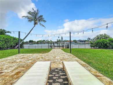 Welcome to Vina Del Mar!  This 4BR/2BA Waterfront Home is only 1 on Isla Del Sol Yacht and Country Club in Florida - for sale on GolfHomes.com, golf home, golf lot