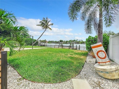 Welcome to Vina Del Mar!  This 4BR/2BA Waterfront Home is only 1 on Isla Del Sol Yacht and Country Club in Florida - for sale on GolfHomes.com, golf home, golf lot