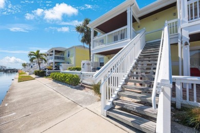 Sporting pastel-colored, Bermuda-styled exteriors, this on St. Petersburg Country Club in Florida - for sale on GolfHomes.com, golf home, golf lot