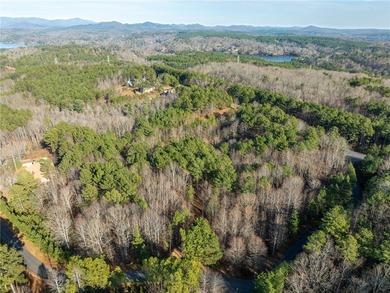 Beautifully wooded lot with gentle build site and some long on The Cliffs At Keowee Falls in South Carolina - for sale on GolfHomes.com, golf home, golf lot
