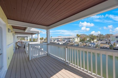 Sporting pastel-colored, Bermuda-styled exteriors, this on St. Petersburg Country Club in Florida - for sale on GolfHomes.com, golf home, golf lot