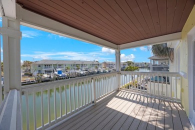 Sporting pastel-colored, Bermuda-styled exteriors, this on St. Petersburg Country Club in Florida - for sale on GolfHomes.com, golf home, golf lot
