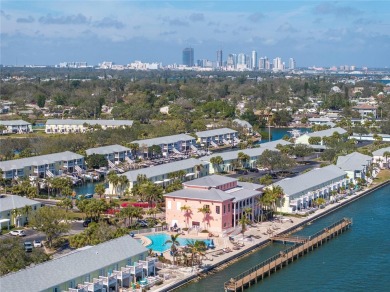 Sporting pastel-colored, Bermuda-styled exteriors, this on St. Petersburg Country Club in Florida - for sale on GolfHomes.com, golf home, golf lot