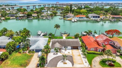 Welcome to Vina Del Mar!  This 4BR/2BA Waterfront Home is only 1 on Isla Del Sol Yacht and Country Club in Florida - for sale on GolfHomes.com, golf home, golf lot