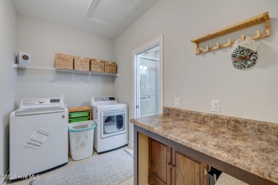 Welcome Home! Beautifully maintained and full of thoughtful on Cape Fear National At Brunswick Forest in North Carolina - for sale on GolfHomes.com, golf home, golf lot