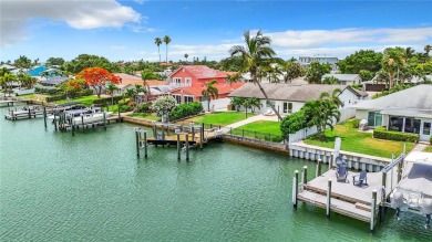 Welcome to Vina Del Mar!  This 4BR/2BA Waterfront Home is only 1 on Isla Del Sol Yacht and Country Club in Florida - for sale on GolfHomes.com, golf home, golf lot