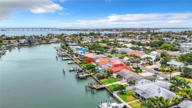 Welcome to Vina Del Mar!  This 4BR/2BA Waterfront Home is only 1 on Isla Del Sol Yacht and Country Club in Florida - for sale on GolfHomes.com, golf home, golf lot