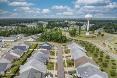 Welcome Home! Beautifully maintained and full of thoughtful on Cape Fear National At Brunswick Forest in North Carolina - for sale on GolfHomes.com, golf home, golf lot