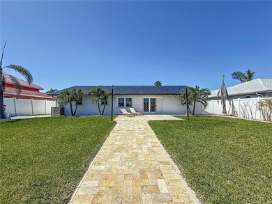 Waterfront Paradise on Vina Del Mar!  Live the ultimate coastal on Isla Del Sol Yacht and Country Club in Florida - for sale on GolfHomes.com, golf home, golf lot