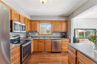 Absolutely meticulously maintained split entry home on corner, 0 on Forest Hills Golf Club in Minnesota - for sale on GolfHomes.com, golf home, golf lot