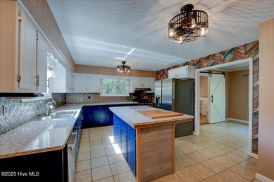 Motivated sellers offering $5,000 buyer incentive! Welcome to on River Bend Golf and Country Club in North Carolina - for sale on GolfHomes.com, golf home, golf lot