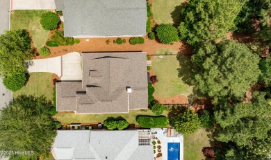Tucked into the sought after gated golf community of Porters on Porters Neck Country Club in North Carolina - for sale on GolfHomes.com, golf home, golf lot