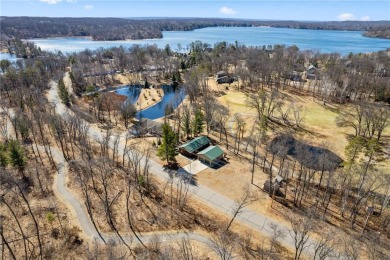 Escape to a luxurious retreat nestled within a resort community on Maddens on Gull Lake - Pine Beach West in Minnesota - for sale on GolfHomes.com, golf home, golf lot