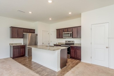 Under contract-accepting backup offers. Set within idyllic on The Links of Lake Bernadette in Florida - for sale on GolfHomes.com, golf home, golf lot