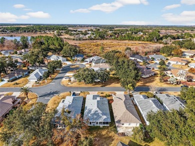 Nestled inside the sought-after 55+ golf community of Royal on Monarch At Royal Highlands in Florida - for sale on GolfHomes.com, golf home, golf lot