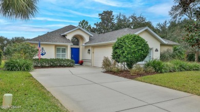 This beautifully updated 3-bedroom 2-bath pool home shows like on Plantation Bay Golf and Country Club in Florida - for sale on GolfHomes.com, golf home, golf lot