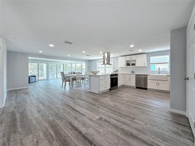 This isn't just a home, It's a LIFESTYLE! Welcome to this on Gulf Harbors Golf Course in Florida - for sale on GolfHomes.com, golf home, golf lot