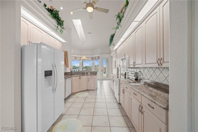 NEVER FLOODED ON THE INSIDE! LOW FLOOD INSURANCE COSTS! This on Royal Tee Country Club in Florida - for sale on GolfHomes.com, golf home, golf lot