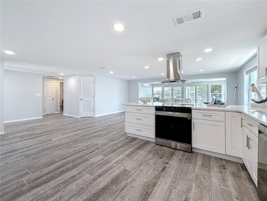 This isn't just a home, It's a LIFESTYLE! Welcome to this on Gulf Harbors Golf Course in Florida - for sale on GolfHomes.com, golf home, golf lot