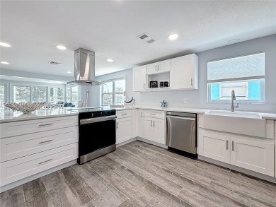 This isn't just a home, It's a LIFESTYLE! Welcome to this on Gulf Harbors Golf Course in Florida - for sale on GolfHomes.com, golf home, golf lot