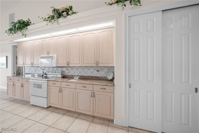 NEVER FLOODED ON THE INSIDE! LOW FLOOD INSURANCE COSTS! This on Royal Tee Country Club in Florida - for sale on GolfHomes.com, golf home, golf lot