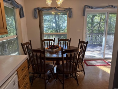 Quaint cottage near Greers Ferry Lake and all Fairfield Bay on Mountain Ranch Golf Club in Arkansas - for sale on GolfHomes.com, golf home, golf lot