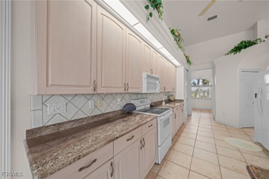 NEVER FLOODED ON THE INSIDE! LOW FLOOD INSURANCE COSTS! This on Royal Tee Country Club in Florida - for sale on GolfHomes.com, golf home, golf lot