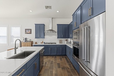 Welcome to this beautifully maintained Warwick Model located in on Sterling Grove Golf & Country Club in Arizona - for sale on GolfHomes.com, golf home, golf lot