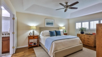 This beautifully updated 3-bedroom 2-bath pool home shows like on Plantation Bay Golf and Country Club in Florida - for sale on GolfHomes.com, golf home, golf lot