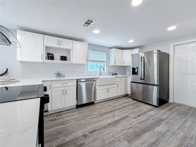 This isn't just a home, It's a LIFESTYLE! Welcome to this on Gulf Harbors Golf Course in Florida - for sale on GolfHomes.com, golf home, golf lot