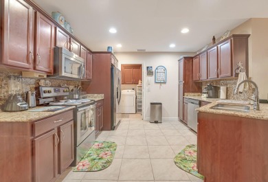 This charming home is located in the highly sought-after Spanish on Spanish Lakes I in Florida - for sale on GolfHomes.com, golf home, golf lot