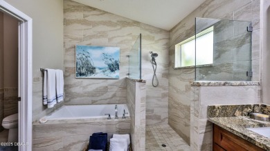 This beautifully updated 3-bedroom 2-bath pool home shows like on Plantation Bay Golf and Country Club in Florida - for sale on GolfHomes.com, golf home, golf lot