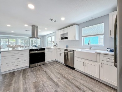 This isn't just a home, It's a LIFESTYLE! Welcome to this on Gulf Harbors Golf Course in Florida - for sale on GolfHomes.com, golf home, golf lot