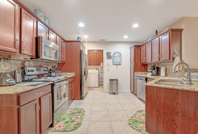 This charming home is located in the highly sought-after Spanish on Spanish Lakes I in Florida - for sale on GolfHomes.com, golf home, golf lot