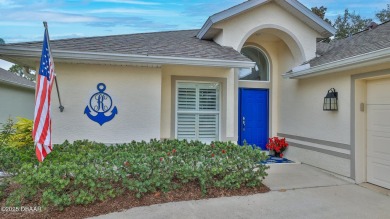 This beautifully updated 3-bedroom 2-bath pool home shows like on Plantation Bay Golf and Country Club in Florida - for sale on GolfHomes.com, golf home, golf lot