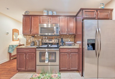 This charming home is located in the highly sought-after Spanish on Spanish Lakes I in Florida - for sale on GolfHomes.com, golf home, golf lot