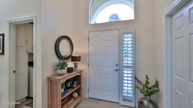 This beautifully updated 3-bedroom 2-bath pool home shows like on Plantation Bay Golf and Country Club in Florida - for sale on GolfHomes.com, golf home, golf lot