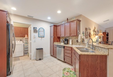 This charming home is located in the highly sought-after Spanish on Spanish Lakes I in Florida - for sale on GolfHomes.com, golf home, golf lot