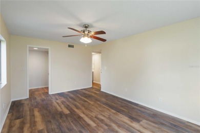 Beautifully updated and move-in ready 2-bedroom, 2-bath on Capri Isle Golf Club in Florida - for sale on GolfHomes.com, golf home, golf lot