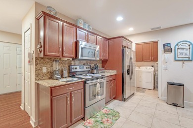 This charming home is located in the highly sought-after Spanish on Spanish Lakes I in Florida - for sale on GolfHomes.com, golf home, golf lot