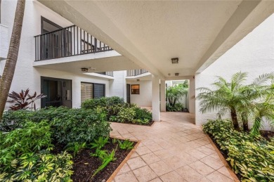 Impressive updates, serene setting, unbeatable location in on Club at Pelican Bay Golf Course in Florida - for sale on GolfHomes.com, golf home, golf lot