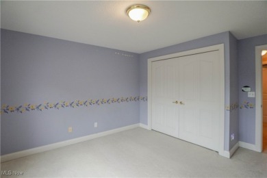Beautiful 4 bedroom, 3.5 bath custom built home in the sought on Roses Run Country Club in Ohio - for sale on GolfHomes.com, golf home, golf lot