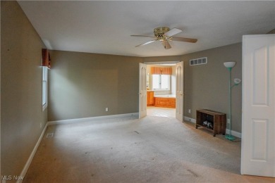 Beautiful 4 bedroom, 3.5 bath custom built home in the sought on Roses Run Country Club in Ohio - for sale on GolfHomes.com, golf home, golf lot