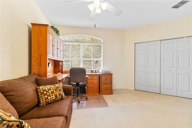 Discover the comfort and ease of turnkey living in this spacious on Spanish Wells Golf and Country Club in Florida - for sale on GolfHomes.com, golf home, golf lot