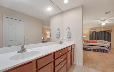 This charming home is located in the highly sought-after Spanish on Spanish Lakes I in Florida - for sale on GolfHomes.com, golf home, golf lot