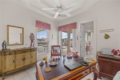 NEVER FLOODED ON THE INSIDE! LOW FLOOD INSURANCE COSTS! This on Royal Tee Country Club in Florida - for sale on GolfHomes.com, golf home, golf lot