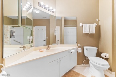 Discover the comfort and ease of turnkey living in this spacious on Spanish Wells Golf and Country Club in Florida - for sale on GolfHomes.com, golf home, golf lot