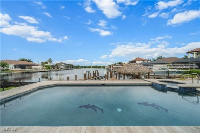 NEVER FLOODED ON THE INSIDE! LOW FLOOD INSURANCE COSTS! This on Royal Tee Country Club in Florida - for sale on GolfHomes.com, golf home, golf lot